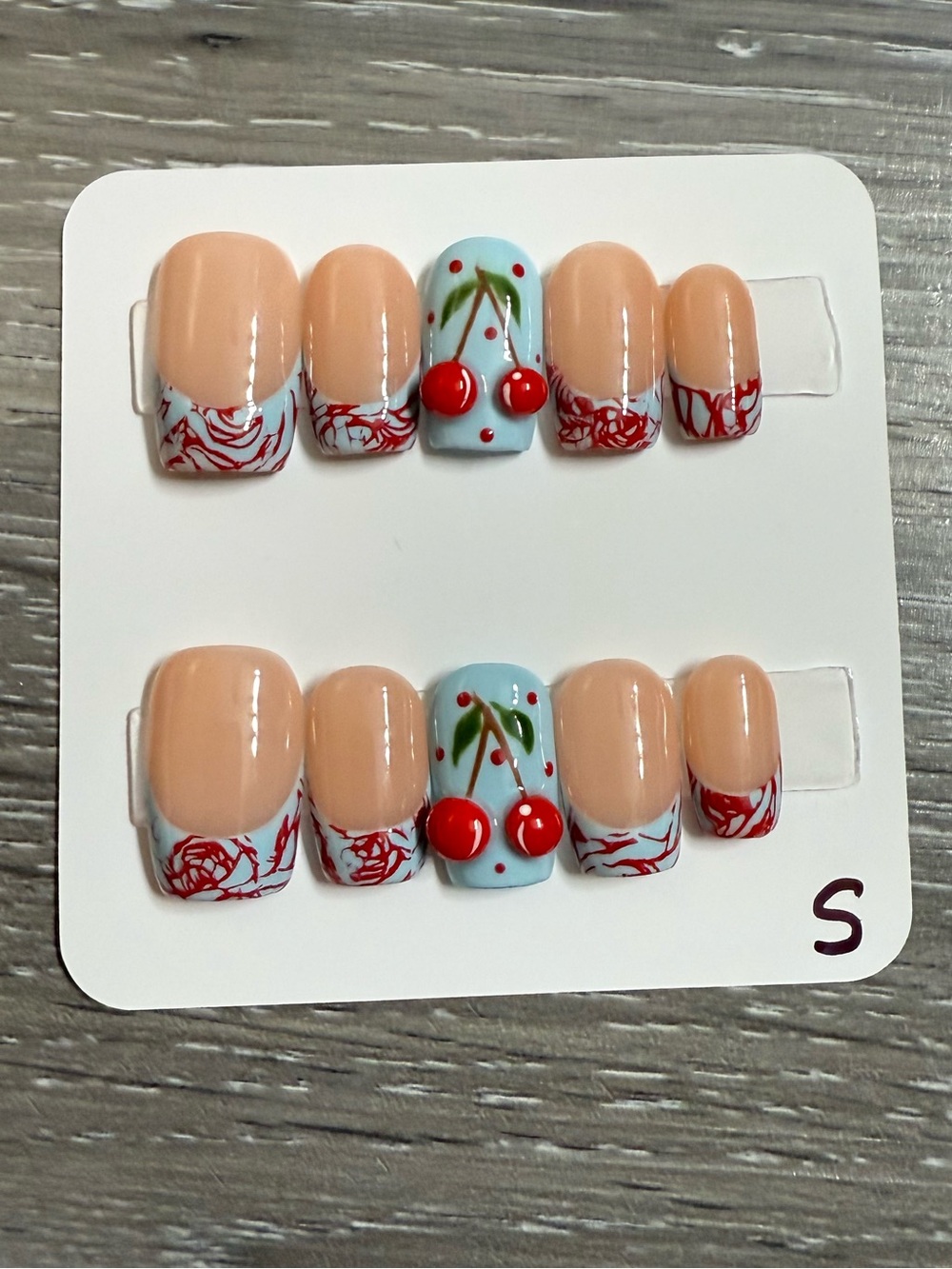 Cherry Accent Press-On Nail Set in Nude and Light Blue